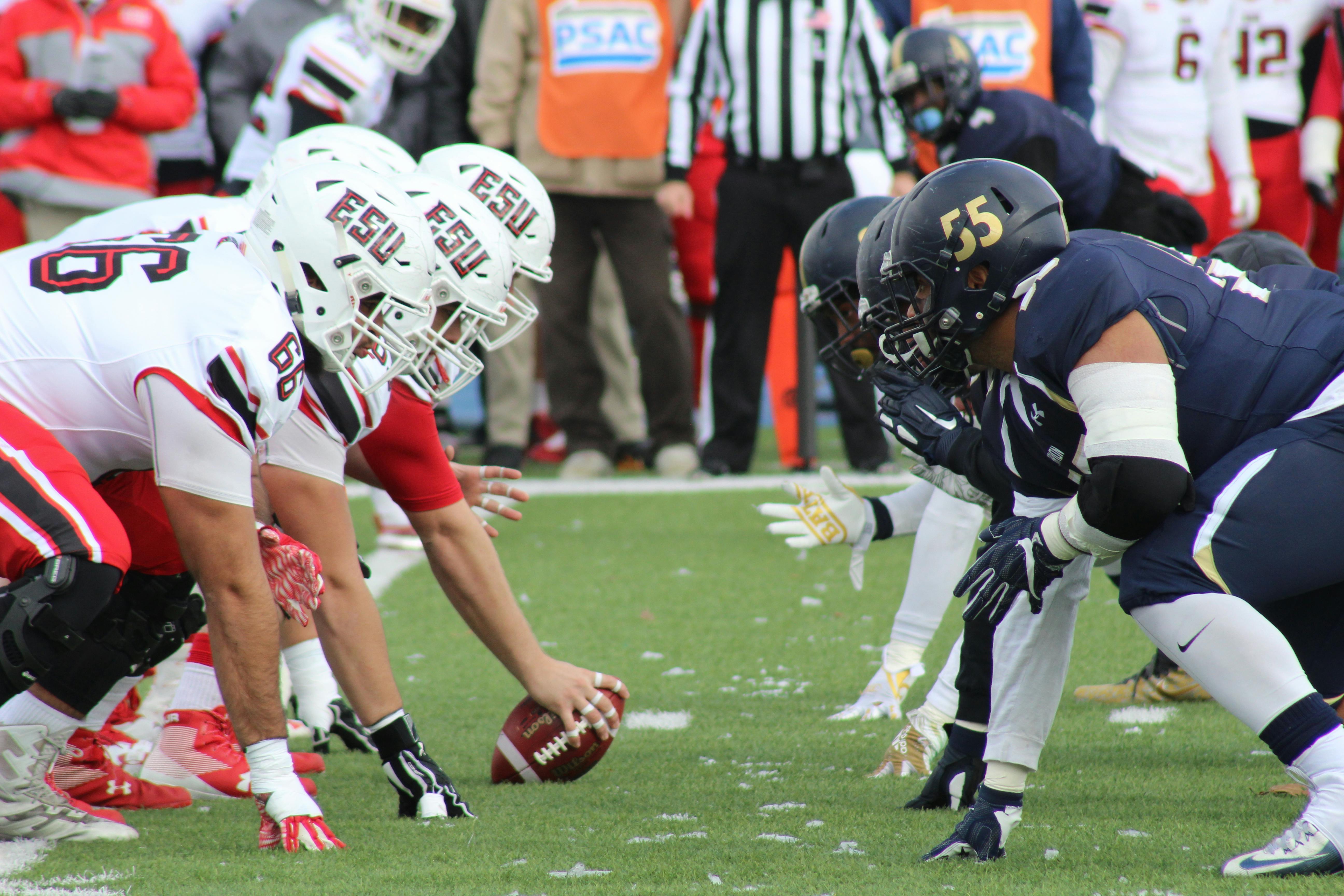 College football players lined up before the snap
